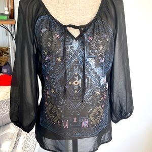 Spoiled black sheer top